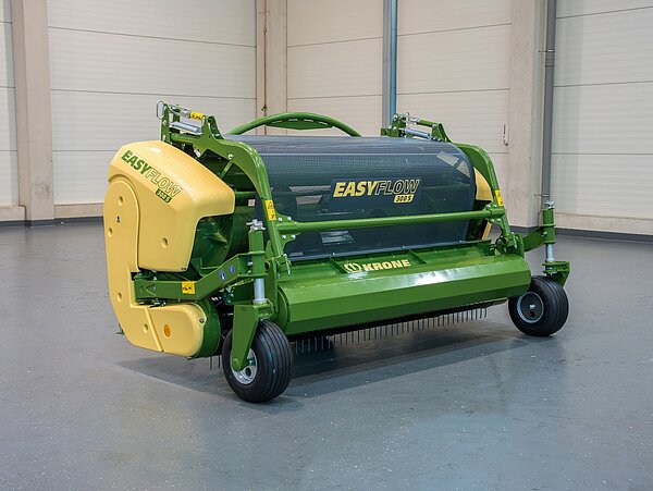 Grass head with crop press roller