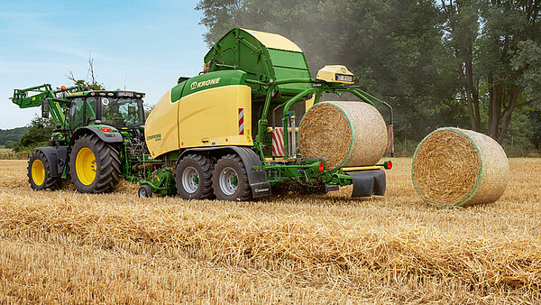 Round balers and combination baler wrappers