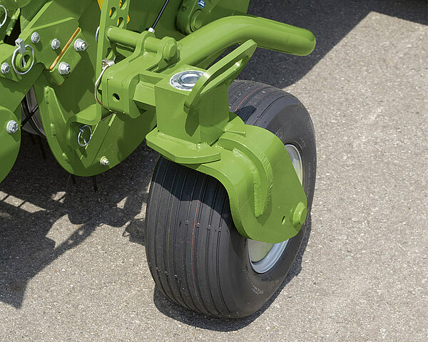 The pivoting gauge wheels