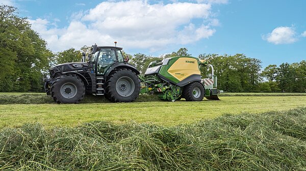 The baler manages the tractor