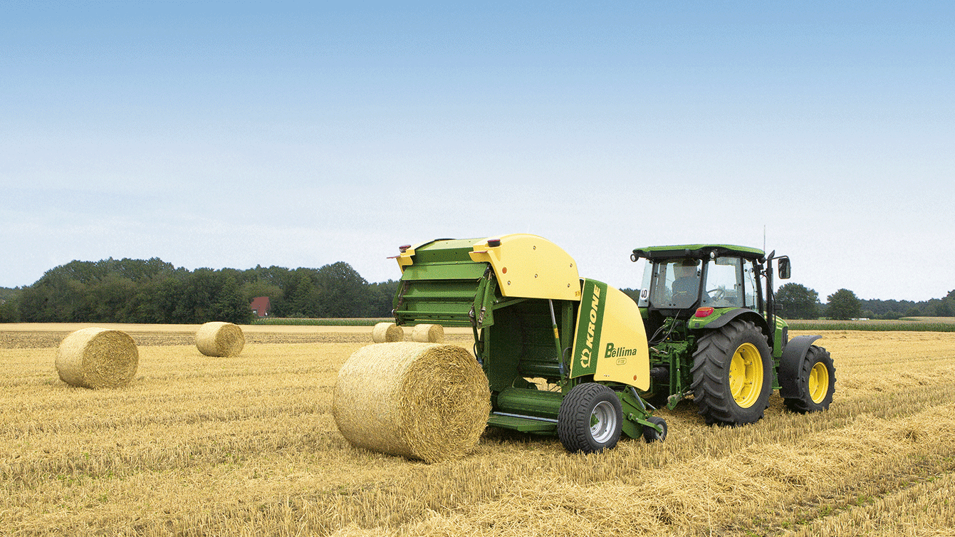 round baler at wok in field krone uk bellima f130