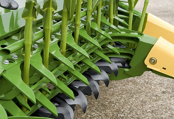 Pulling the crop over the blades